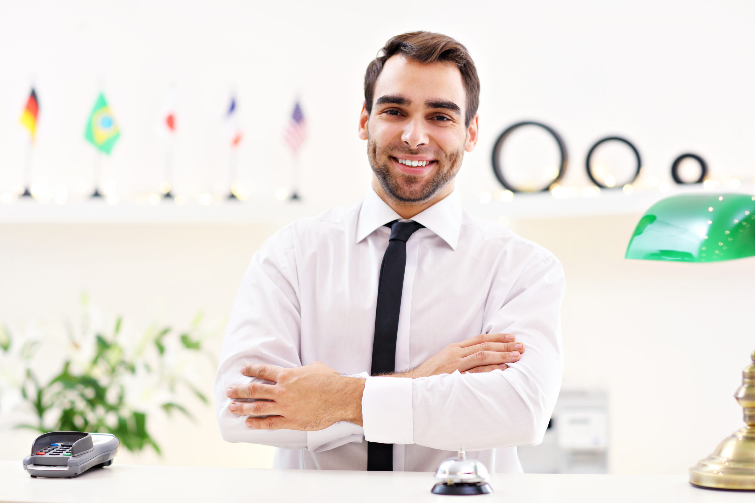 Happy receptionist working in hotel