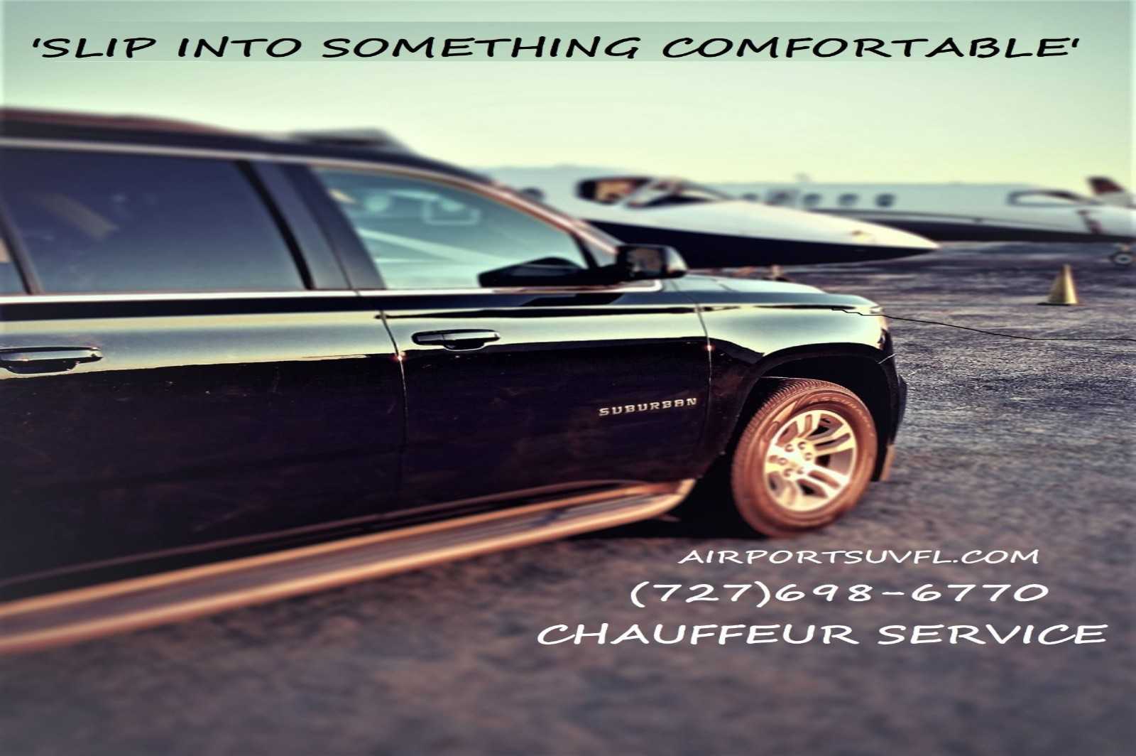 A black luxury Suburban SUV parked on an airport tarmac next to a private jet, representing premium chauffeur services