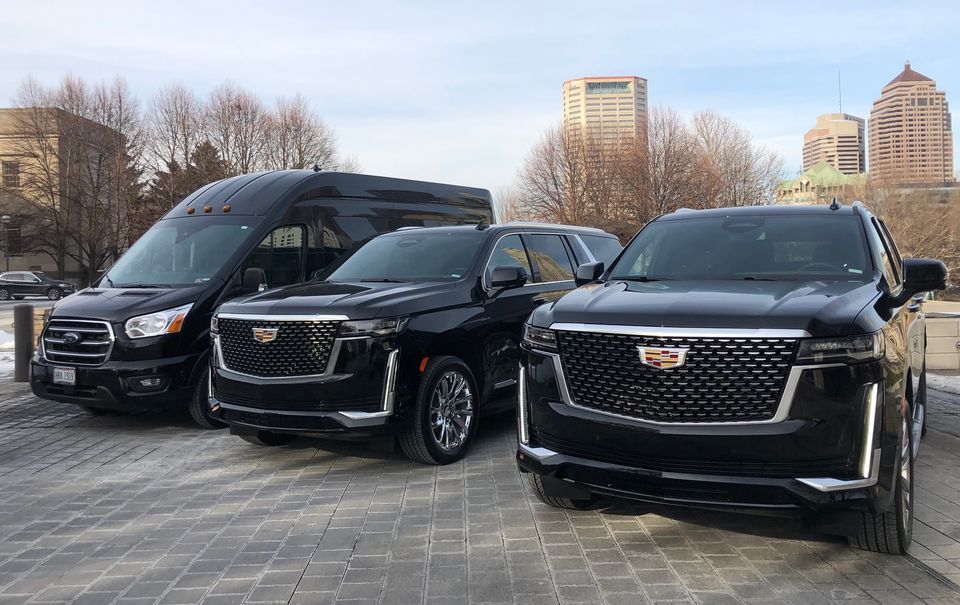 Luxury Cadillac SUVs and Mercedes Sprinter providing Dunedin Car Service with professional chauffeur transportation.